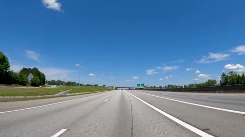 Rear POV view traffic merging onto expressway Bobby Jones Expressway Stock Footage 181641902