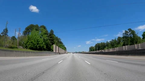 Rear POV view traffic open highway Bobby Jones Expressway Stock Footage 181641585