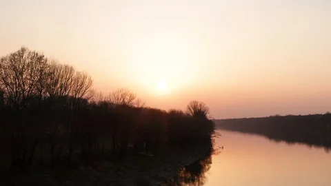 Rear sunset clear sky over the river Sava in Bosnia and Herzegovina. 4k footage Stock Footage 127393932