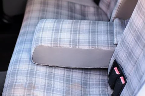 Rear textile seats wit armrest in an old retro car Foto stock