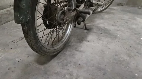 Rear Three-Quarter View of a Vintage Rusty Sachs Moped Stock Footage 345338747