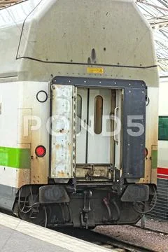Rear of train passenger car, nobody around Stock Photos