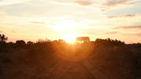 Rear view 4x4 on sandy track at sunset Wentworth NSW Australia Stock Footage 74995048