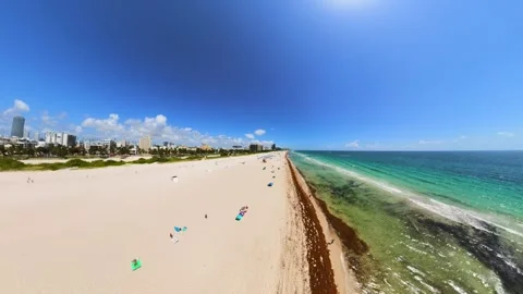 Rear view aerial flight Miami Beach coastline Stock Footage 342083047