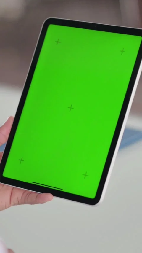 Rear View of African Doctor using Tablet with Green Chroma Screen, Vertical Stock Footage 339575402