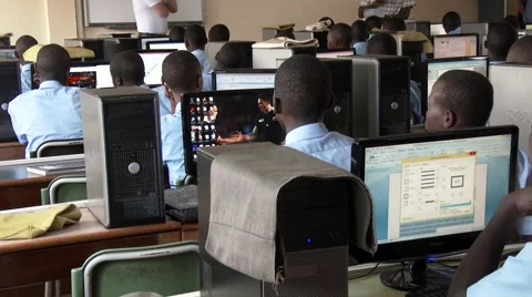 Rear view of African students study at computer lab of school - Education Africa Stock Footage 58974413