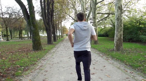 Rear View Of Athletic Young Man Jogging Stock Footage 42161550