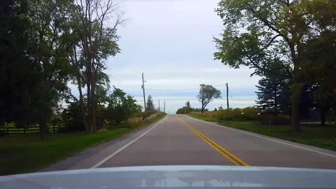 Rear View From Back of Car Driving Rural Countryside Road Stock Footage 117072620
