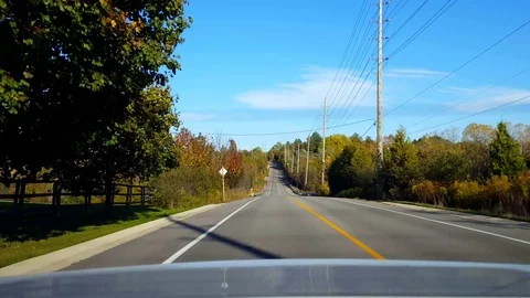 Rear View From Back of Car Driving Rural Countryside Road During Day Stock Footage 118271139