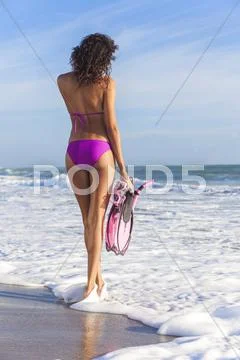 Rear view beautiful bikini woman at beach Stock Photos