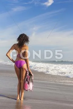 Rear view beautiful bikini woman at beach Stock Photos