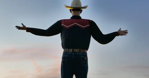 Rear View of Big Tex against Sunset Stock Footage