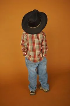 Rear View Of A Boy Wearing Western Clothing Stock Photos
