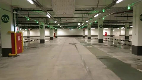 Rear view camera, the car moves through a huge underground parking. Parking o 스톡 동영상 199106731