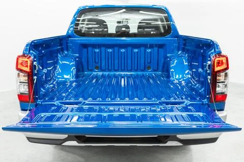 Rear view of a car  pickup with an open trunk. Exterior of a modern car. Stock Photos