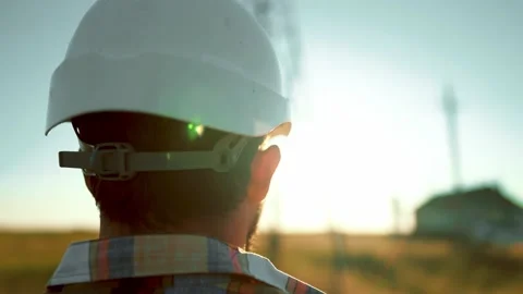 Rear view construction worker in helmet ... | Stock Video | Pond5