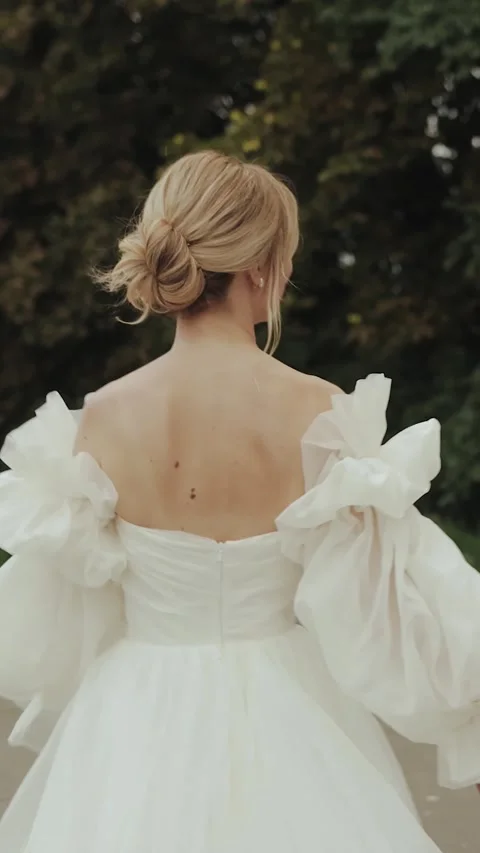 Rear view of a couple walking during a wedding, a romantic wedding couple in Video stock 307779867