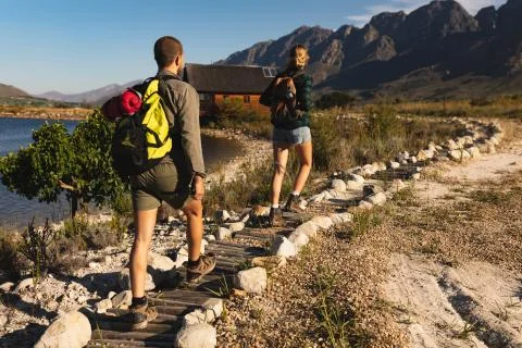Rear view of couple walking on a path Stock Photos