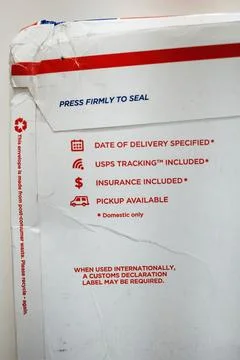 Rear view of damaged envelope of an USPS United States Postal Service Parcel 写真素材