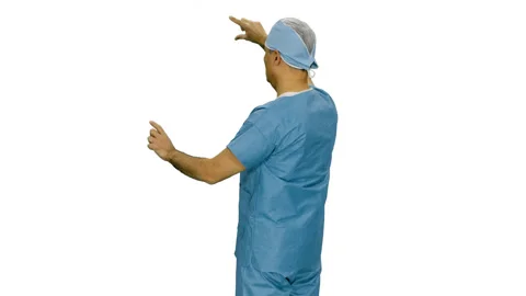 Rear view of doctor using virtual touchscreen, alpha channel Stock Footage 124555995