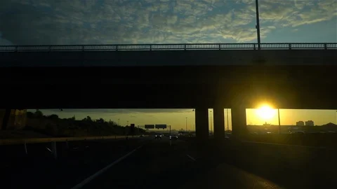 Rear view driving on highway at sunset Stock Footage 118907736