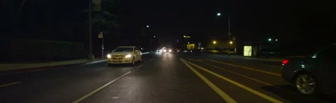 Rear view of a Driving Plate: Car travels on West Colorado Boulevard in Stock Footage 59335381