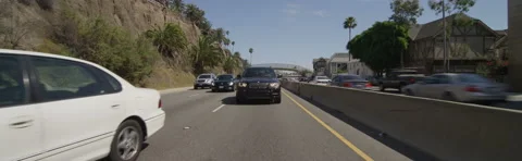 Rear view of a Driving Plate: Car travels north from Santa Monica, California on Stock Footage 59484260