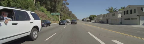 Rear view of a Driving Plate: Car travels on Highway 1 in Santa Monica, Stock Footage 59487783