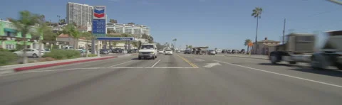 Rear view of a Driving Plate: Car travels on Highway 1 in Santa Monica, Stock Footage 59489212