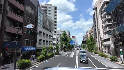 Rear View Driving Through Central Tokyo Street Stock Footage 336804151