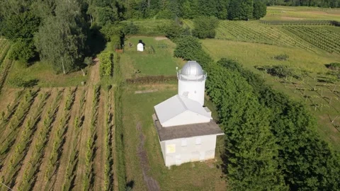 Rear View Drone Flyover Above Observatory and Sunset Vineyards Video stock 334940422