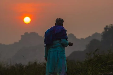 Rear view of a elder man looking at sunrise Stock Photos