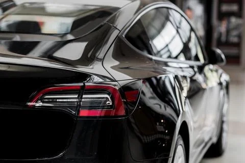 Rear view expensive auto. Stock Photos