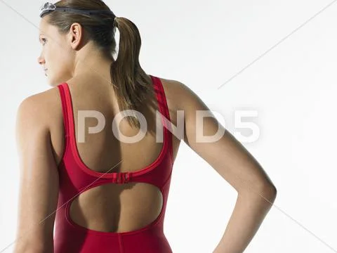 Rear View Of Female Swimmer In Red Swimwear Stock Photos