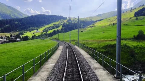 Rear View From the Glacier Express Train on Railroad Tracks 動画素材 291032914