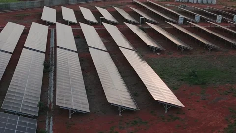 Rear view of ground-mounted solar photovoltaic arrays and support structures in Stock-Footage 340571362