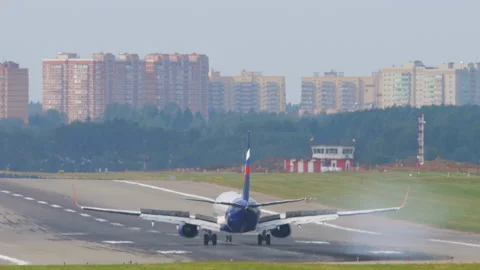 Rear view of landing aircraft Stock Footage 158888473