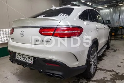 Rear view of luxury very expensive new white Mercedes-Benz GLE Coupe AMG 63s Stock Photos