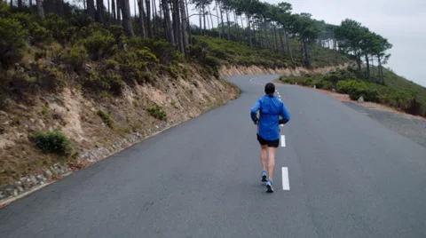 Rear view man exercising Stock Footage 53084755