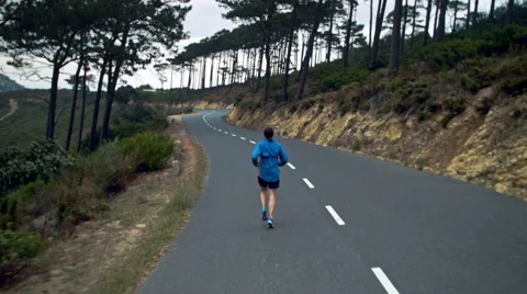 Rear view man exercising Stock Footage 53084757