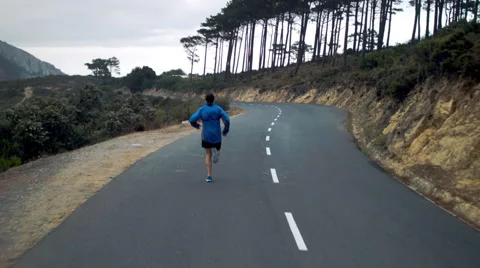 Rear view man exercising Stock Footage 53084805