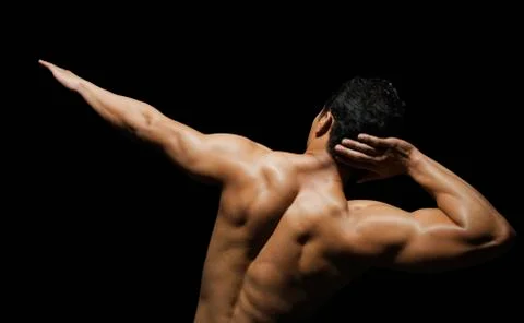 Rear view of a man exercising Stock Photos