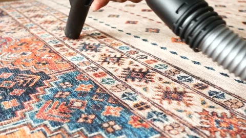 Rear view of man hand cleaning with vacuum cleaner carpet, Stock Footage 271594349