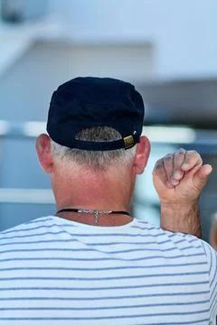 Rear view of man making a gesture Stock Photos