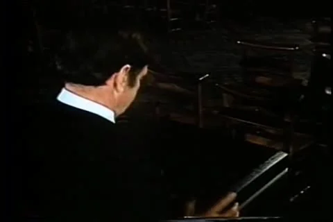 Rear view of man opening briefcase filled with cash Stock Footage 11346293