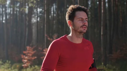 Rear view of man running Stock Footage 102830124