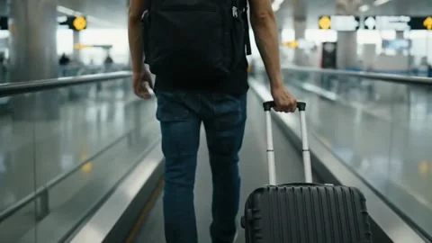 Rear View: Man Walking to Flight Boarding Gate. Stock Footage 316280874