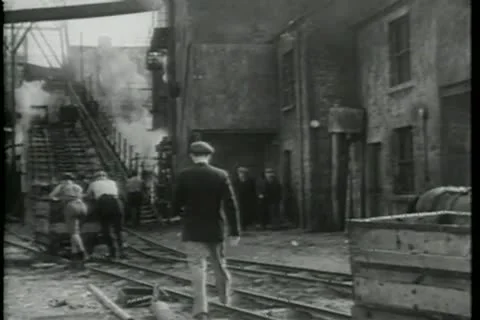 Rear view of men working in coal mine Stock Footage 11352612