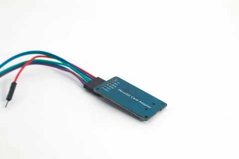 Rear view of a microSD card reader module with its connecting cable. This mod Stock Photos