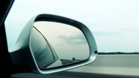 Rear view mirror during highway drive Stock Footage 18140775